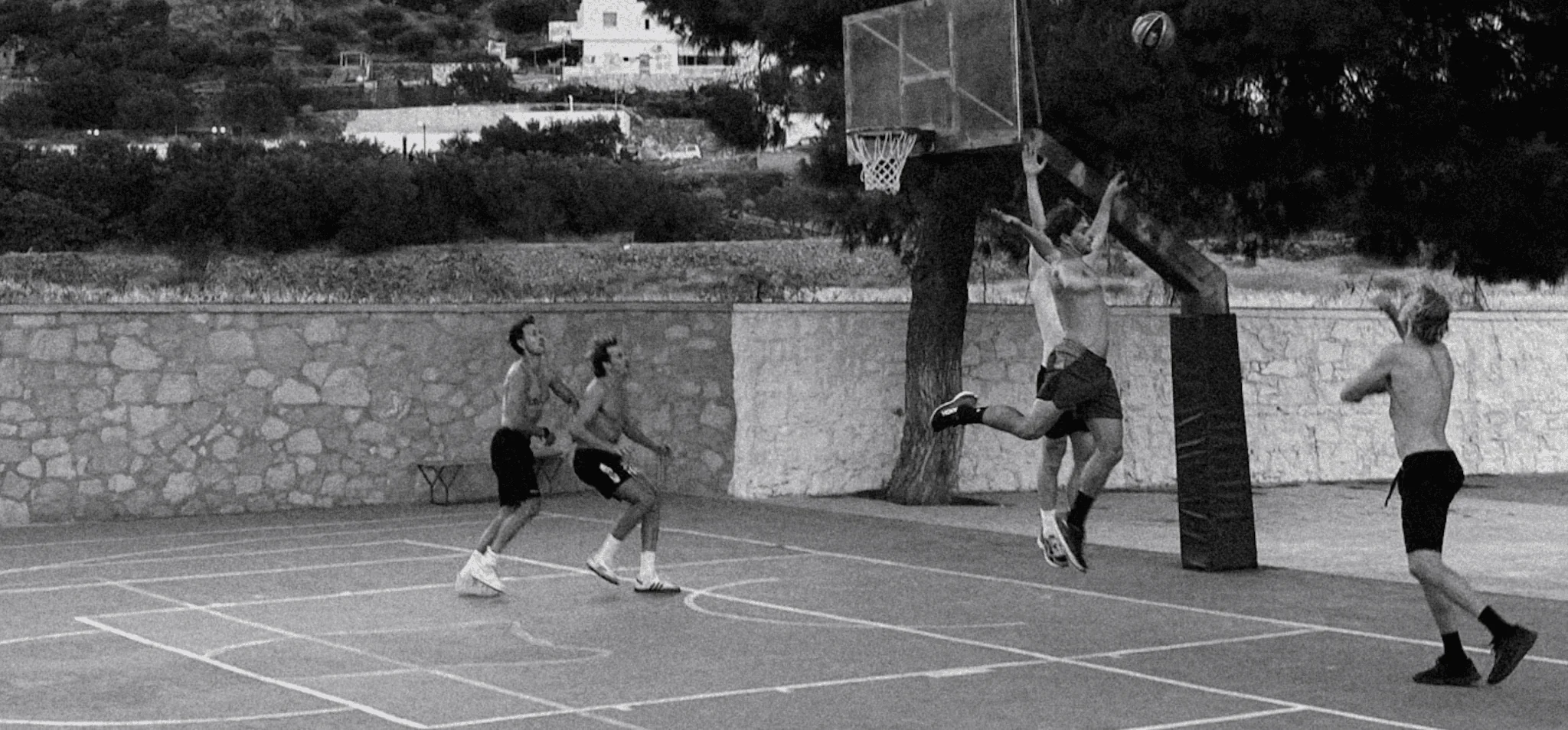 Founder Sports Club members playing basketball